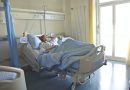 photo of woman lying in hospital bed